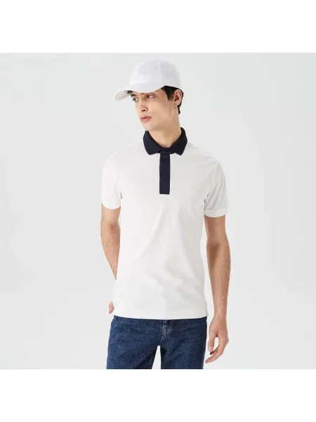 Поло Lacoste белое