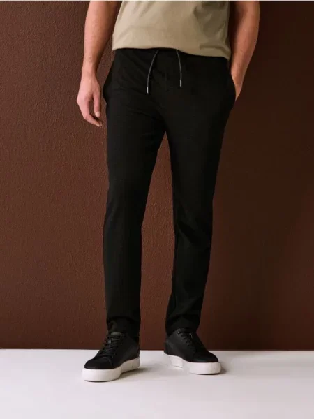 Sinsay Spodnie dresowe jogger ottoman czarny