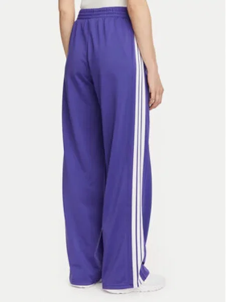 Teplákové kalhoty adidas fialové