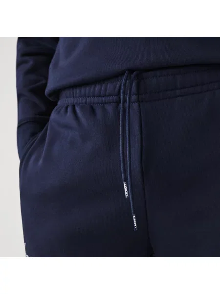 Lacoste Spodnie Dresowe Z Nadrukiem Tapered Fit granatowe
