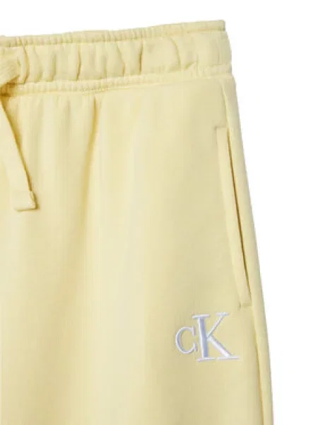 Teplákové kalhoty Calvin Klein Jeans žluté