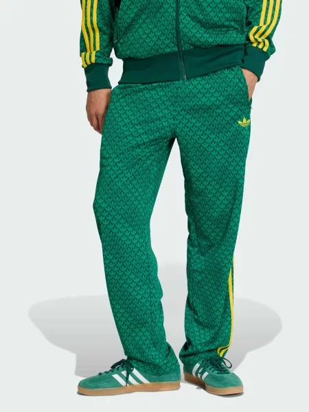 Повседневные переработанный брюки Adidas зеленые