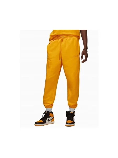Nohavice Nike žltá