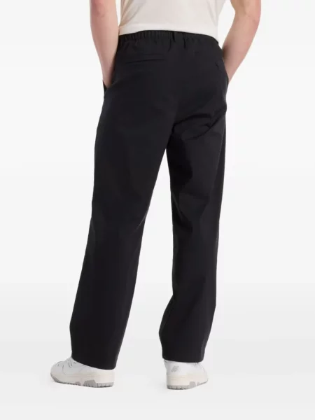 Панталони jogger New Balance с връзки с дантела черно