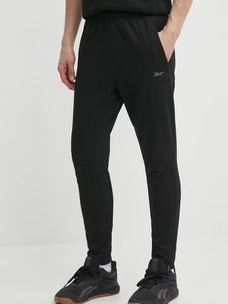 Tréninkové kalhoty Reebok Strength hladké černá