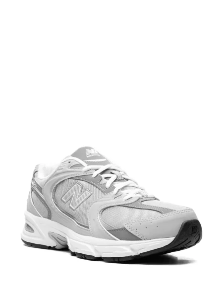 Nėriniuotos sportbačiai New Balance su raišteliais pilka