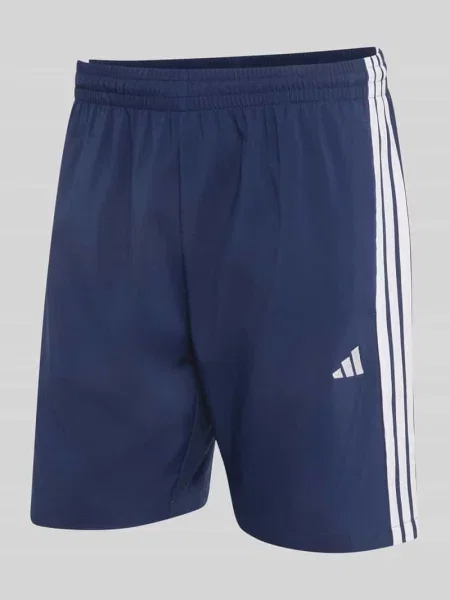 Szorty dresowe o kroju regular fit z nadrukiem z logo Adidas Sportswear granatowe