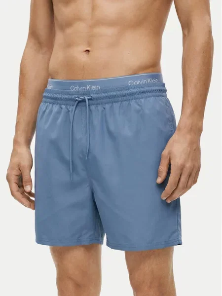 Calvin Klein Swimwear Maudymosi trumpikės tamsiai džinso / balkšva mėlyna