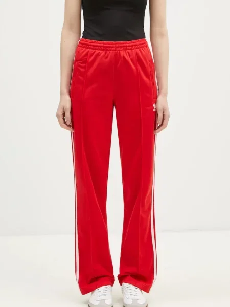Adidas Originals spodnie dresowe Firebird z aplikacją czerwony