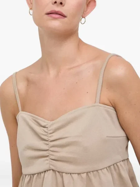 Cu peplum top Notes Du Nord