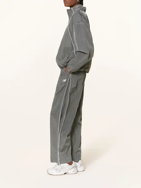 New Balance Spodnie Dresowe grau