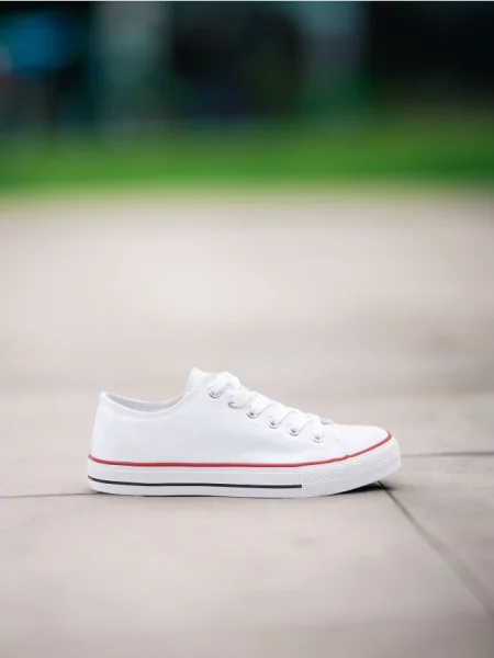 Спортивні кросівки білий