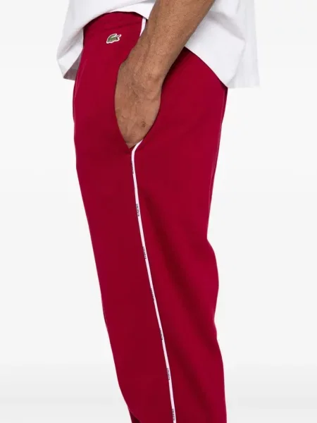 Pantaloni Lacoste cu broderie
