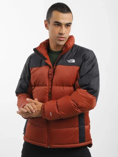 The North Face Пуховик коричневий