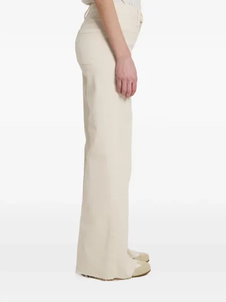 Jeansy Mother z naszywanymi kieszeniami