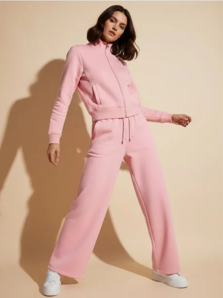 Широкі спортивні штани рожевий