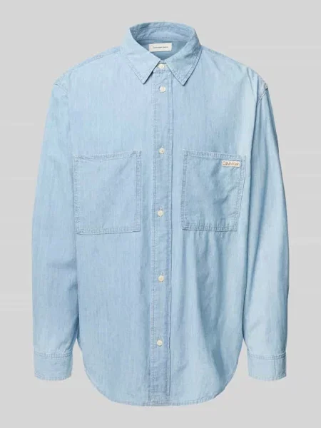 Koszula jeansowa o kroju regular fit z nakładanymi na piersi Calvin Klein Jeans niebieska