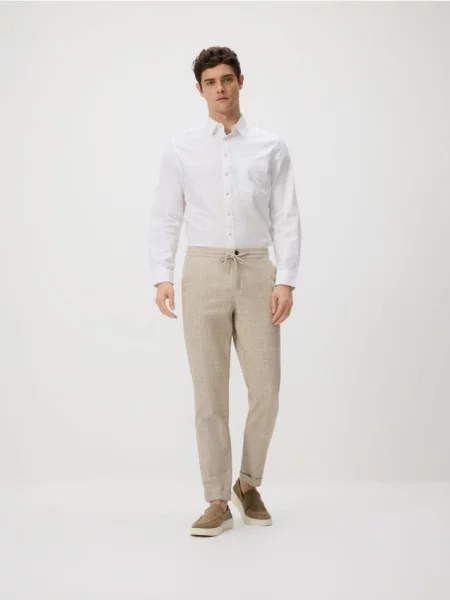 Reserved Pantaloni carrot cu conținut ridicat de in bej