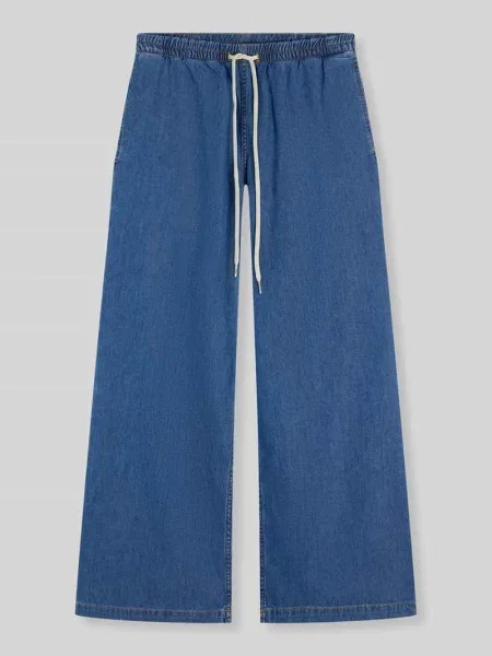 Jeansy o kroju loose fit z czystej bawełny z tunelem Tommy Hilfiger błękitne