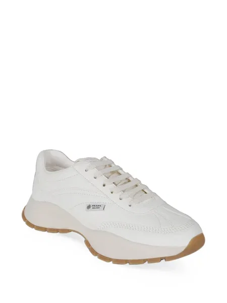 Sneakerși Prada din piele cu autograf alb