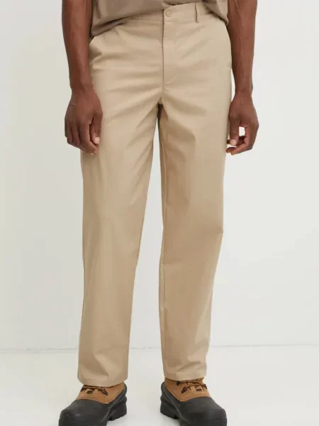 New Balance spodnie Athletics Standard Pant proste beżowy