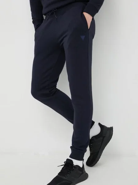 Tepláky Guess tmavomodrá hladké černé