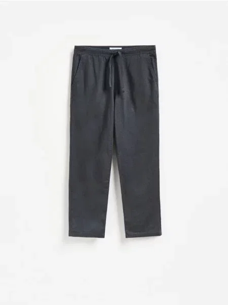 Reserved Pantaloni jogger din metalizat albastru