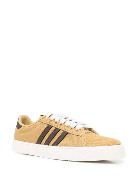 Nėriniuotos sportbačiai Adidas su raišteliais ruda