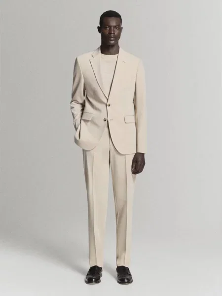 Spodnie garniturowe Milan slim fit Mężczyzna 44 MANGO MAN beżowy