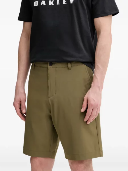 Pantaloni chino Oakley cu imagine verde