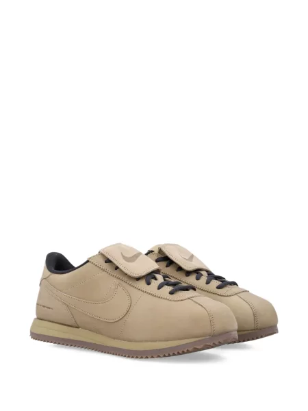 Iš natūralios odos retro stiliaus kelnės Nike apvaliu kaklu ruda