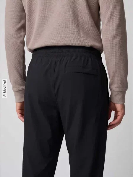 Spodnie dresowe o kroju tapered z nadrukiem logo model Vibe' Under Armour czarne