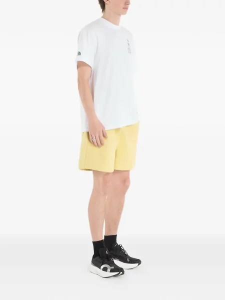 Pantaloni scurți The North Face cu autograf galben