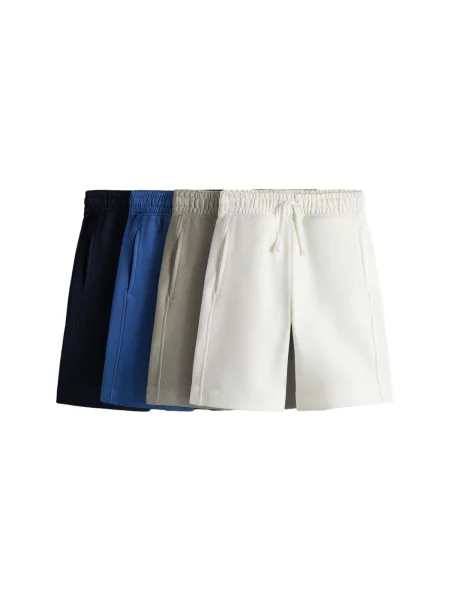 The Set Pantaloni albastru / bleumarin / verde pastel / natural alb