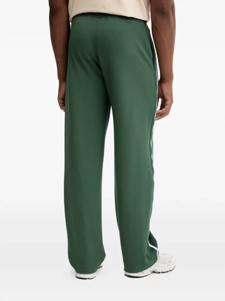 Ριγέ τρέξιμο παντελόνι Ea7 Emporio Armani με σχέδιο πράσινο