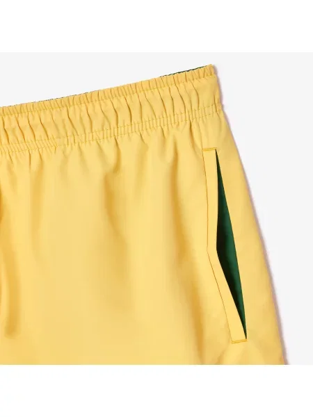 Шорты Lacoste желтые