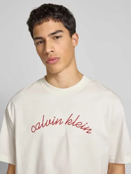 Calvin Klein Jeans t-shirt beżowy z aplikacją biała