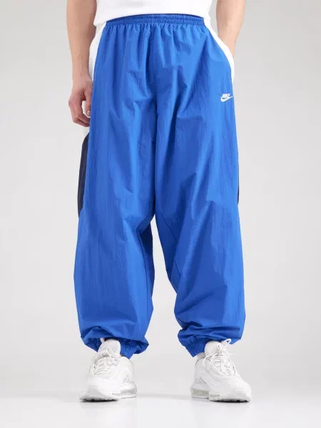 Nike Sportswear Nohavice CLUB kráľovská modrá / tmavomodrá biela