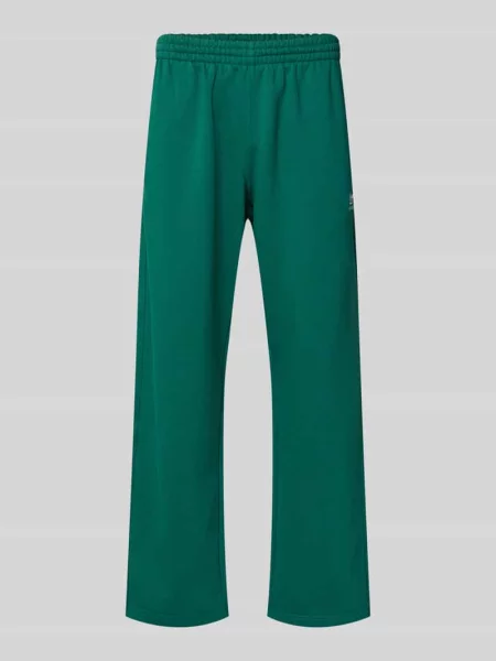Spodnie dresowe o kroju wide fit z elastycznym pasem Adidas Originals zielone