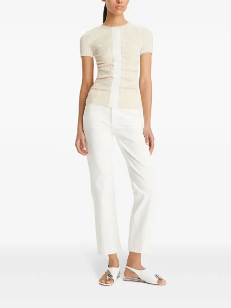 Platėjantys džinsai Tory Burch balta