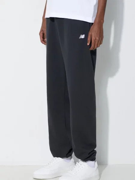 Donji dio trenirke New Balance Essentials French Terry Jogger bez uzorka crna