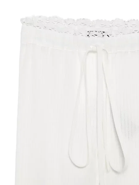 Pantaloni Ann Demeulemeester din dantelă alb