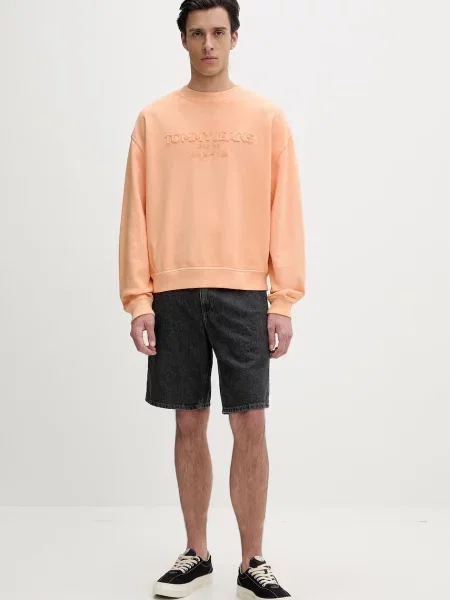 Tommy Jeans pulover z bombažem oranžna