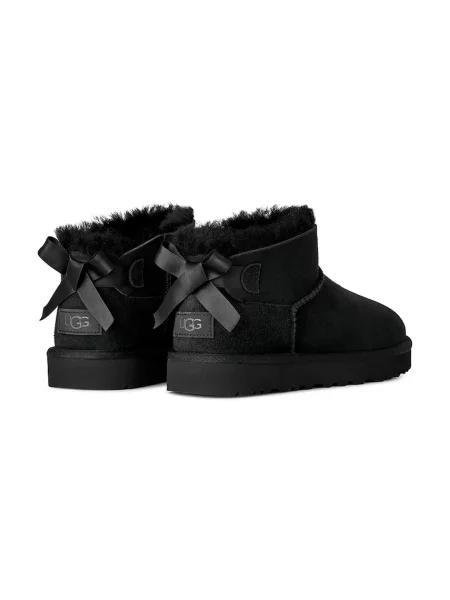 Замшевые сапоги Ugg с бантом
