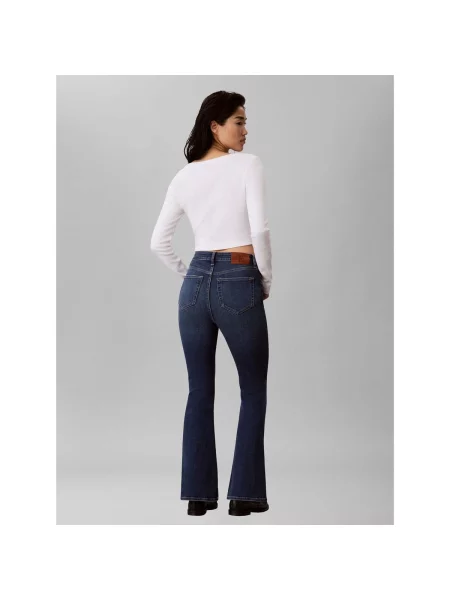 Džínsy so strihom ku čižmám Calvin Klein Jeans s vysokým pásom modrá