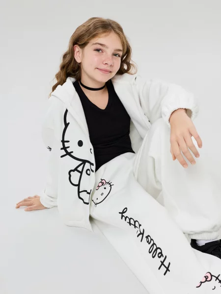 Sinsay Oversize tepláky jogger s potiskem Hello Kitty krémová