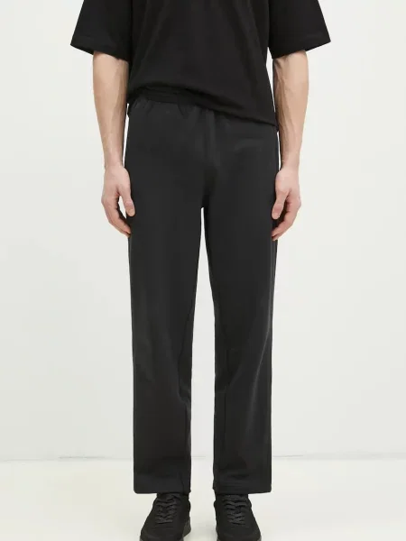 Adidas Originals spodnie dresowe Essential gładkie czarny