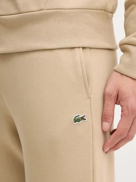 Спортивні штани Lacoste однотонна бежевий
