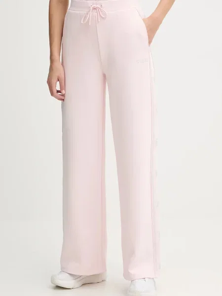 Спортивні штани Guess OCTAVIA з аплікацією рожевий