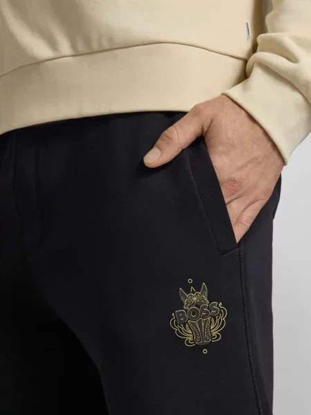 Spodnie sportowe o kroju oversized z czystej bawełny model ‘WEI_CNY’ Boss czarne